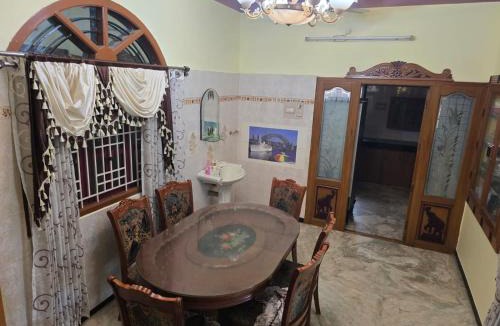 Coimbatore House | Woodland Cottage by Vstays