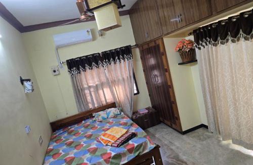 Coimbatore House | Woodland Cottage by Vstays