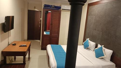 Kochi Hotel | WoodLand Suites