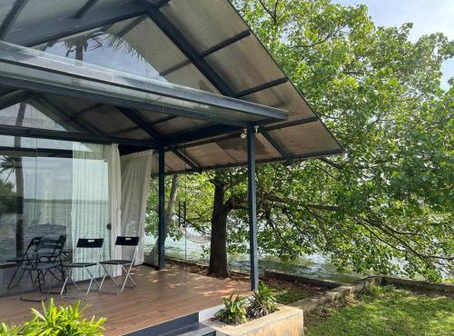 A Glass Haven on the tranquil Munroe Islands in Kollam
