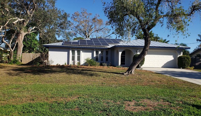 Comfortable updated 3 bedroom home - enclosed, solar heated pool, private yard. in Sarasota