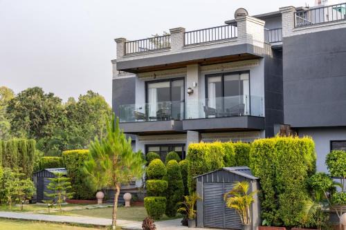 ELIVAAS Aranya Library Villas With Private Pool, Sit-out Area, Common Lounge & Garden With Forest Views