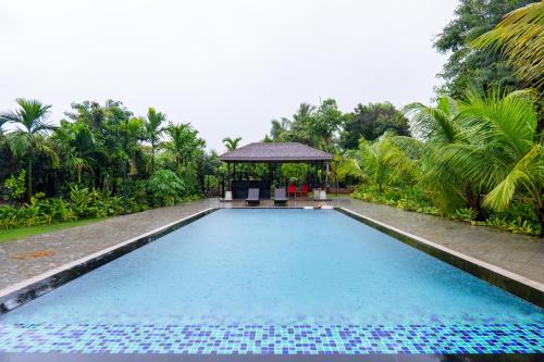 ELIVAAS Signature AARAA VILAS 4-BHK Luxury Pool Villa with Home Theatre, Sports Court & Panoramic Hill Views