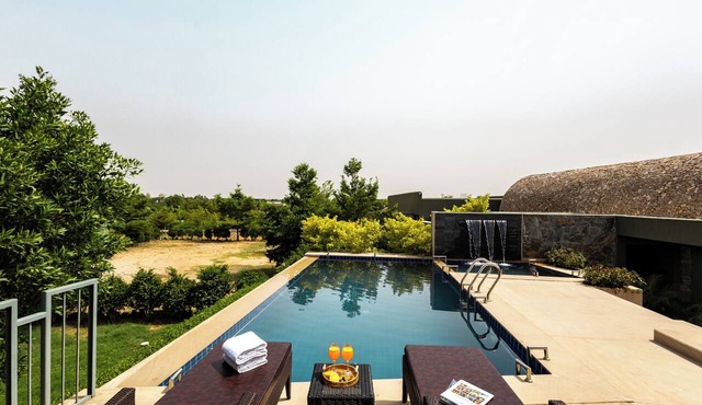 ELIVAAS Stone Age 4BHK Villa with Pool