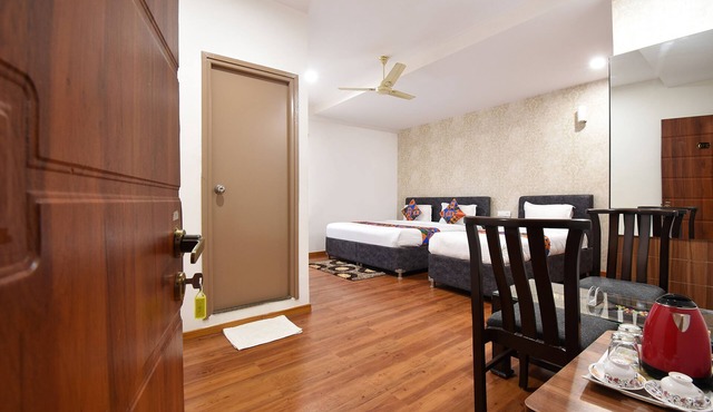 Fabhotel Dhanvitha Suites