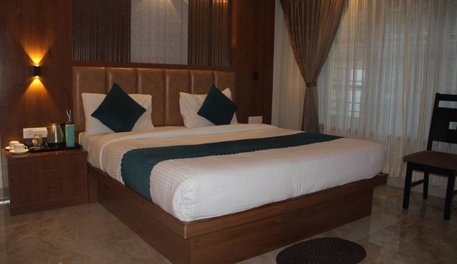 Grandis inn by avkanz luxury suite rooms in the hill top of ooty