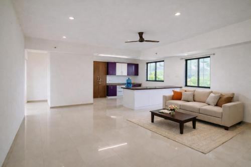 New Spacious 2BHK apartments in Tirupati Near Railway Station with fully equipped kitchen, AC bedrooms, Washing Machine, 24 hours water, caretaker service, and ample space for car parking & ideal for families and pilgrims