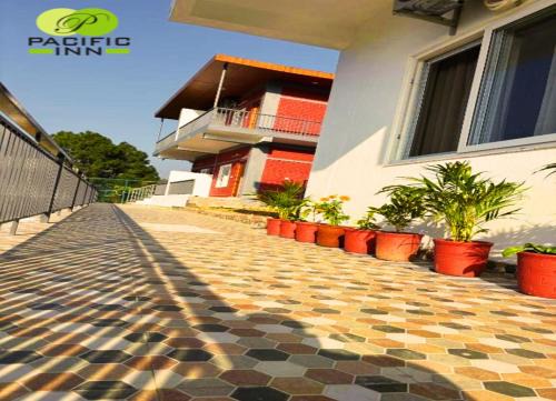 Pacific Inn Vistaar Hotels & Resorts