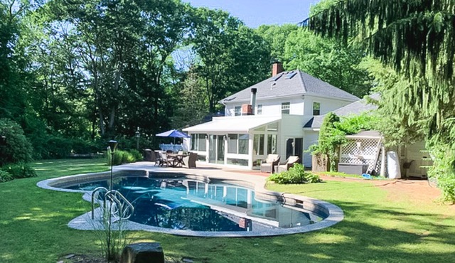 Seacoast home with private pool, sunroom, patio, grill, firepit, & fireplace in Hampton Beach