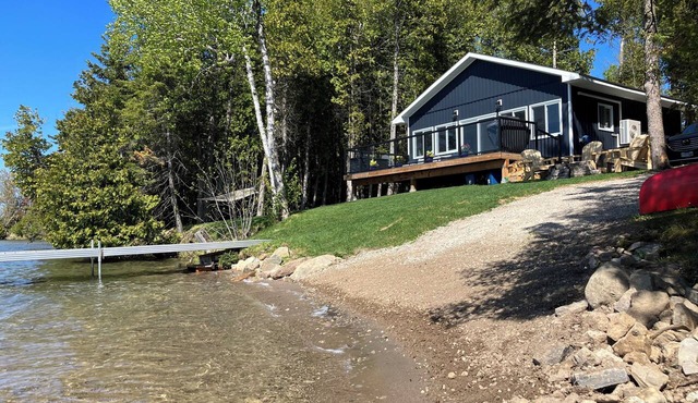 Sunset Cottage with private beach area, fire pit, kayak and canoe! in Sheguiandah