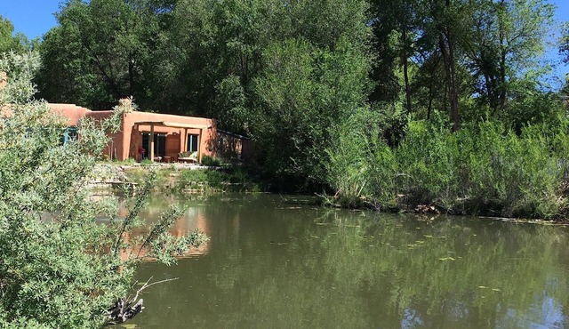 Unique Chimayo Village Adobe Casita on a wildlife pond between Santa Fe and Taos