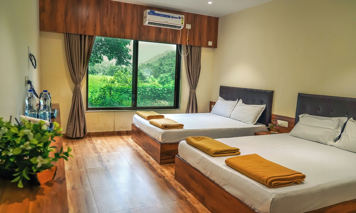 Ulhasnagar Hotel | Whispering Peepul Resort