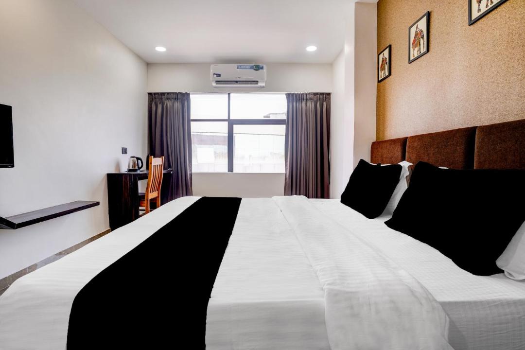 Rajpipla Hotel | Super Townhouse Garudeshwar Dutt Temple Formerly The Grand Unity