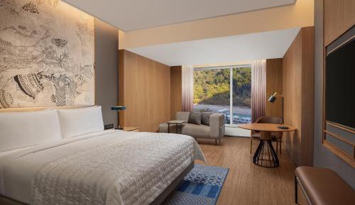 Premium King Pool View - Get Club Lounge access for INR 6000/- for two adults