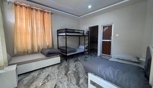 Single Bed in Dormitory Room