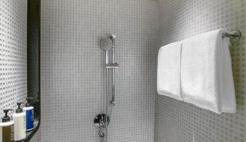 Premier Twin Room with Complimentary IMFL from 6:00 pm to 8 pm at Barcode and Shared Airport Transfer