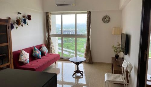 One-Bedroom Apartment with Balcony and City View