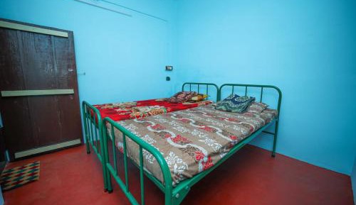 Single Bed in Dormitory Room