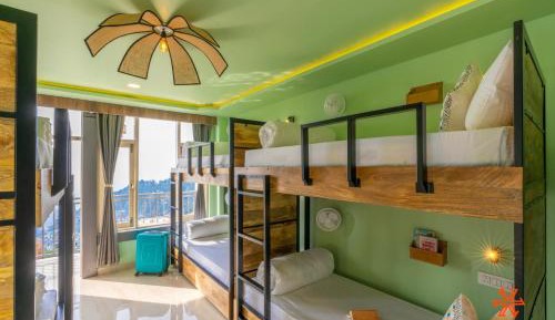 1 Person in 6-Bed Deluxe Dormitory (with Balcony) - Mixed