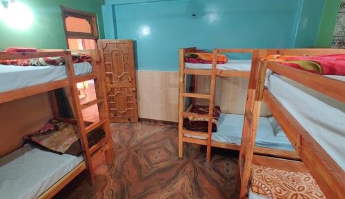 Single Bed in Dormitory Room