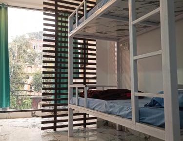 Single Bed in Dormitory Room