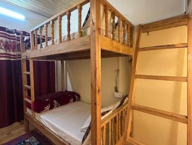 Single Bed in Dormitory Room