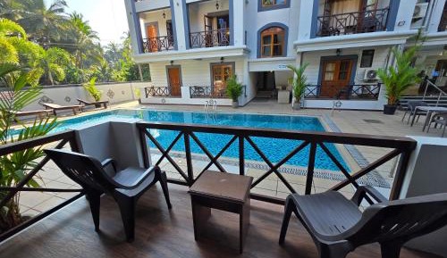 Two bedroom apartment with living room and balcony pool view