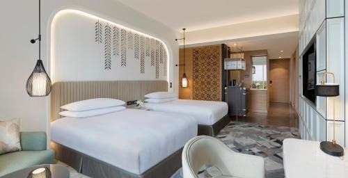 Classic Twin Room with Pool View: 20% off on food,soft beverages, laundry & local transportation(upto 10 km); enjoy 90-min spa at 60mins spa price; BOGO offer on select beverages(5–8 pm) at Connexions Bar