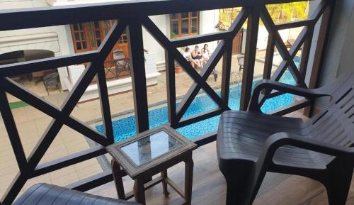 Studio with balcony pool view