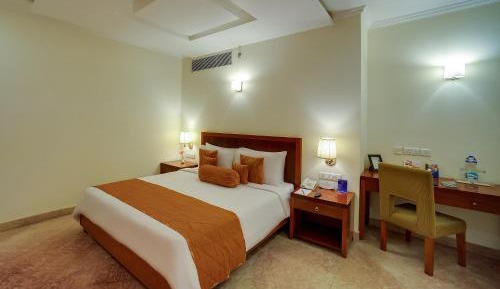 Deluxe Room 1 King Bed with Complimentary tea/coffee service for all our in-house guest at the poolside with some popular evening snacks of Siliguri from 5pm to 7pm
