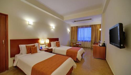 Superior Room 2 Twin Bed with Complimentary tea/coffee service for all our in-house guest at the poolside with some popular evening snacks of Siliguri from 5pm to 7pm