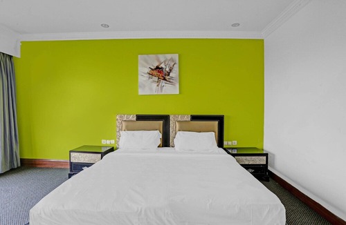 Aarey Colony Hotel | Townhouse 799 Royal Palms Hotel - Lily Collection