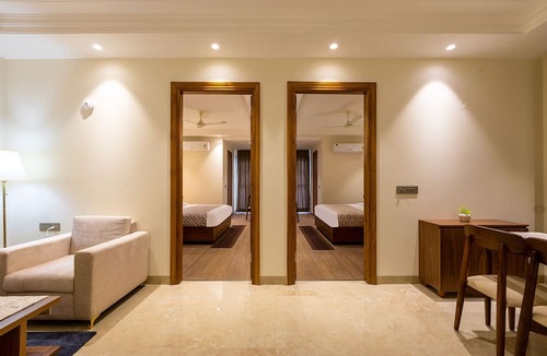 DLF Phase 5 Hotel | FabHotel Exotica Avenue Apartments
