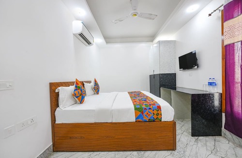Sainik Farm Hotel | FabHotel The Cozy Cloud
