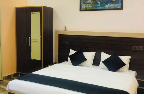 Sidhpur Hotel | Goroomgo Paradise Inn Dharmsala