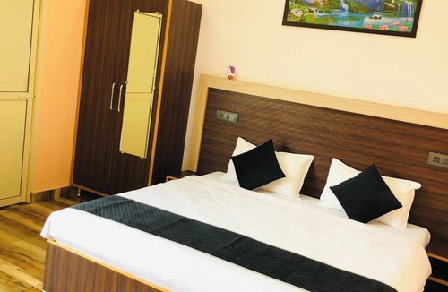 Sidhpur Hotel | Goroomgo Paradise Inn Dharmsala