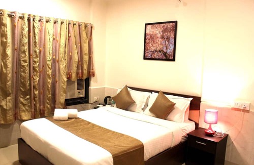 J B Nagar Hotel | Dragonfly Apartments Emerald