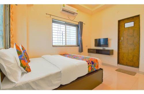 Paud Hotel | FabHotel Golden Heights
