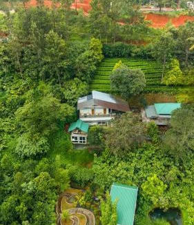 Kunchithanny Villa | ELIVAAS Signature Kavyath Valley 4-BHK Villa With Scenic Mountain View , Private Outdoor Pool, Gym And In-House Tea Garden