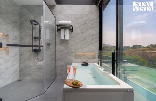 Khattalwada Villa | StayVista at Horizon Block with Infinity Pool, Lawn