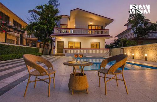 Kune N.m. Villa | StayVista's Brookvale Cottage - Dive into tranquility with pool view and gazebo