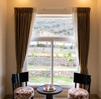Nimbahera Villa | Mandovar Mountain Valley Retreat Pet-friendly Suite In a Private Estate with Shared Pool, Garden, Restaurant & Hill Views