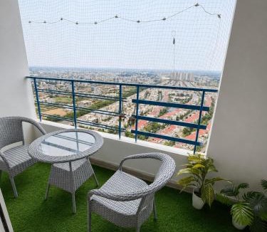 Greater Noida Bed & Breakfast | Aesthetic High-Rise Studio, Balcony & Villa View