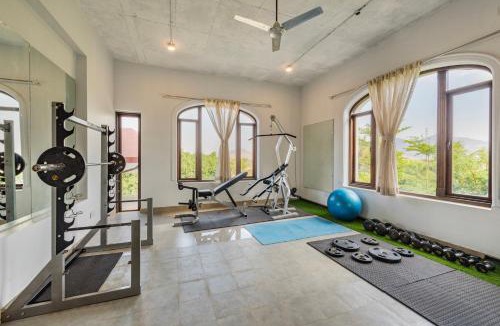 Kadadhe Villa | SaffronStays Zuma Villa - 7BR pet-friendly villa with heated pool, 6000 sqft lawn, play zone & cards room near Pawna Dam
