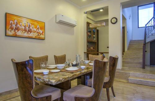 Gurugram Villa | StayVista at Hillside Paradise with Pool, Jacuzzi, kids play area